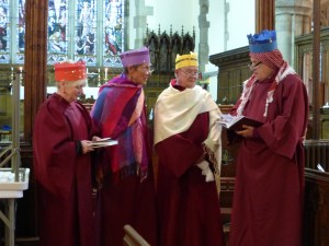 The Four Kings have stopped on the road to Bethlehem and are discussing the gifts they are taking for the new born King